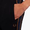Pantaloni de trening cu bandă în dungi Pantaloni de trening cu bandă în dungi