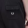 Pantaloni sport pentru bărbați cu detalii de insignă Pantaloni sport pentru bărbați cu detalii de insignă