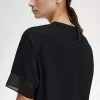 Tricou de damă cu garnitură transparentă din piqué Tricou de damă cu garnitură transparentă din piqué