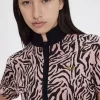 Tricou polo pentru femei cu imprimeu zebră Tricou polo pentru femei cu imprimeu zebră