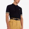 Tricouri polo cu manșete în dungi Tricouri polo cu manșete în dungi